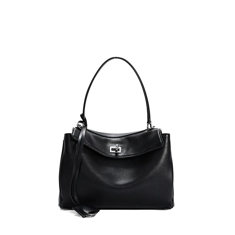 Black handbag with a visible brand logo on a white background