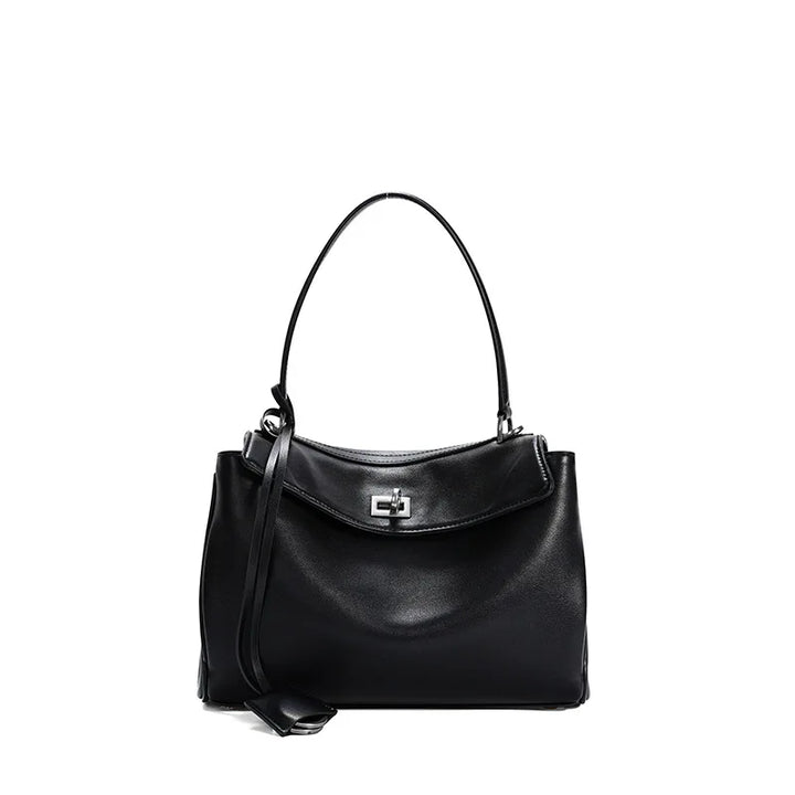 Black handbag with a visible brand logo on a white background